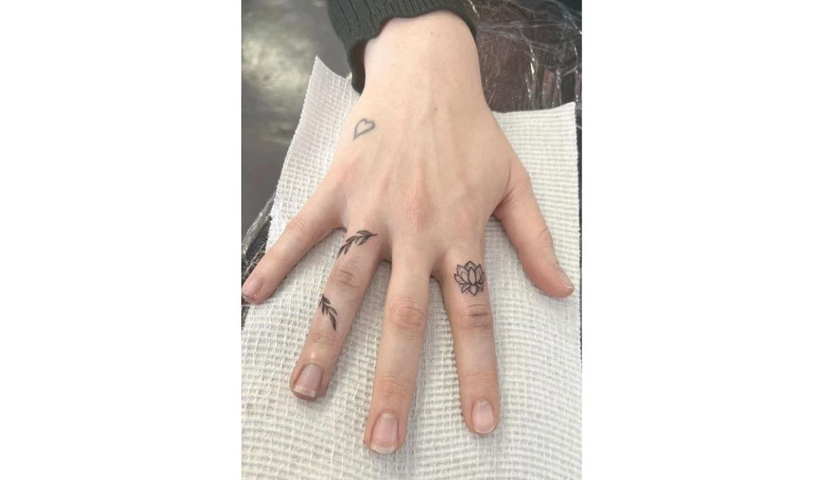 Lotus finger tattoos