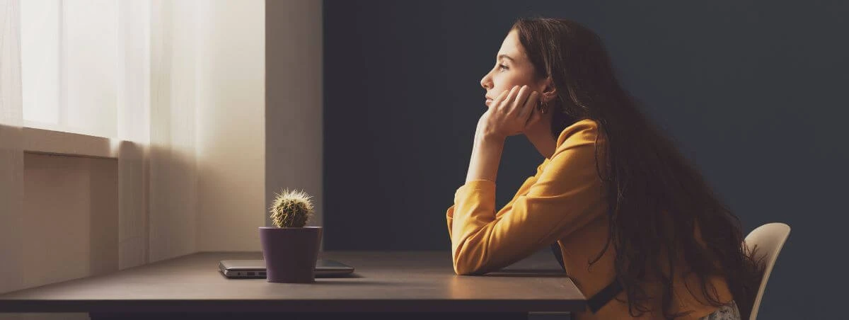 lonely-woman-sitting-at-table