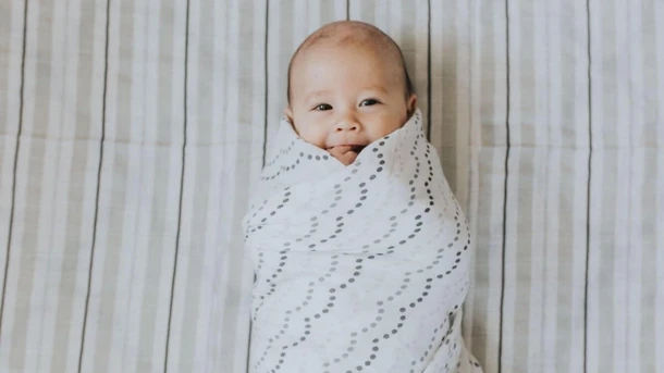 When Can a Baby Sleep With a Blanket?