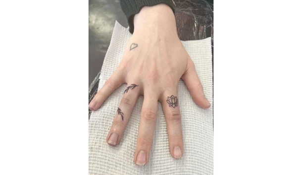 Lotus finger tattoos