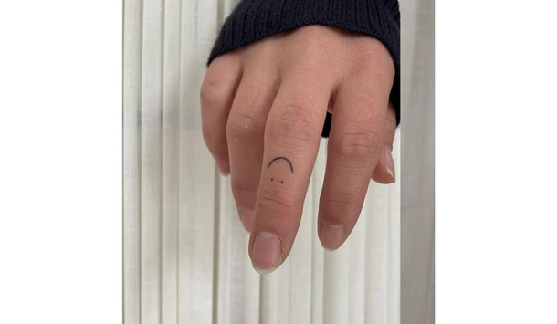 Middle finger tattoo