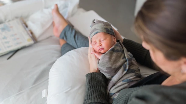 Newborn baby and his mama