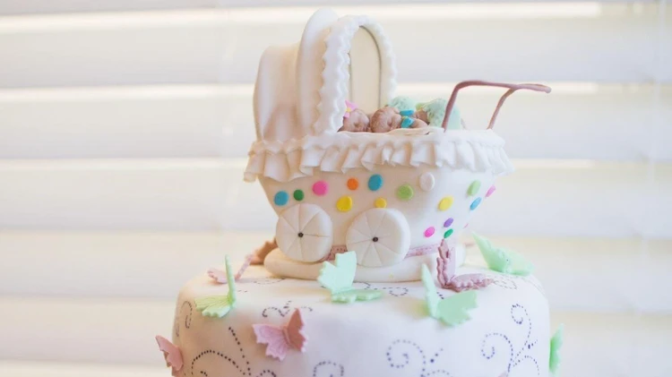 Baby-themed cake baby shower cake