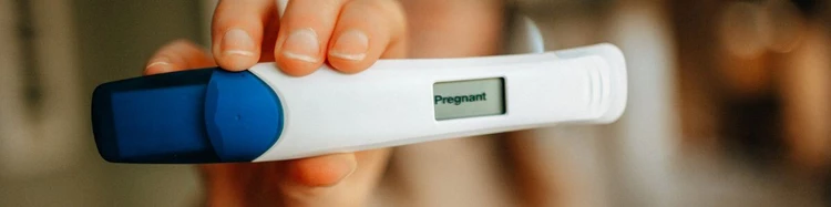 “Pregnant” positive pregnancy test picture