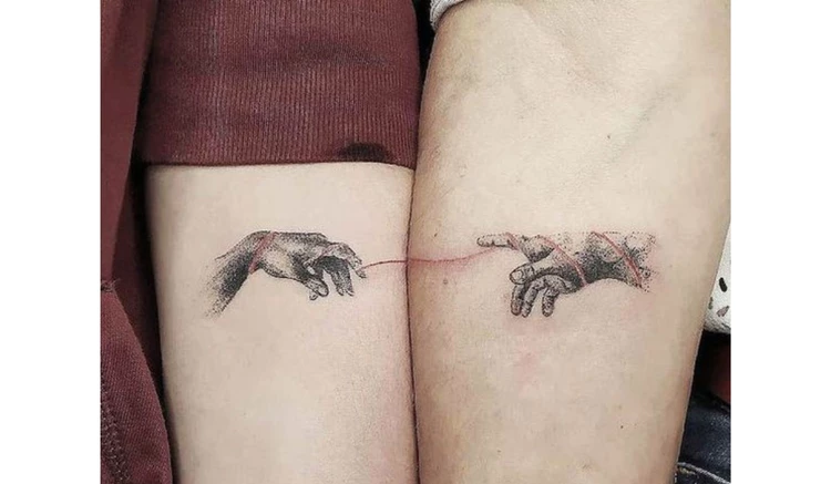 matching mother and son tattoos