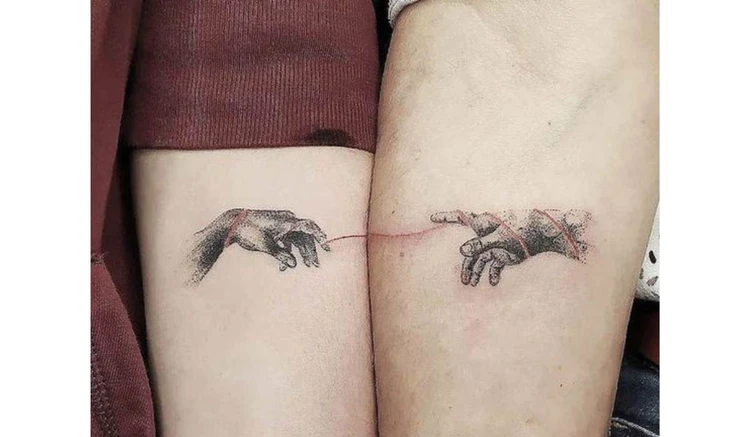 matching mother and son tattoos