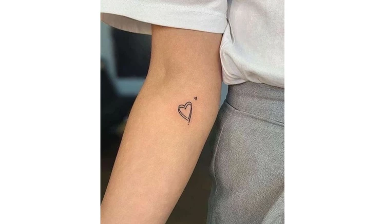 minimalist mother and son heart tattoo