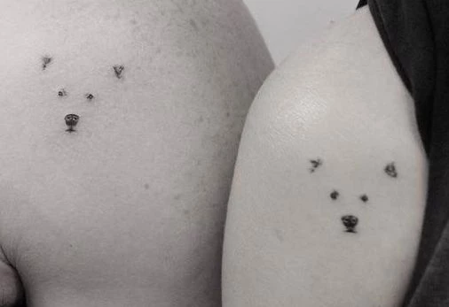 matching mom and son tattoos